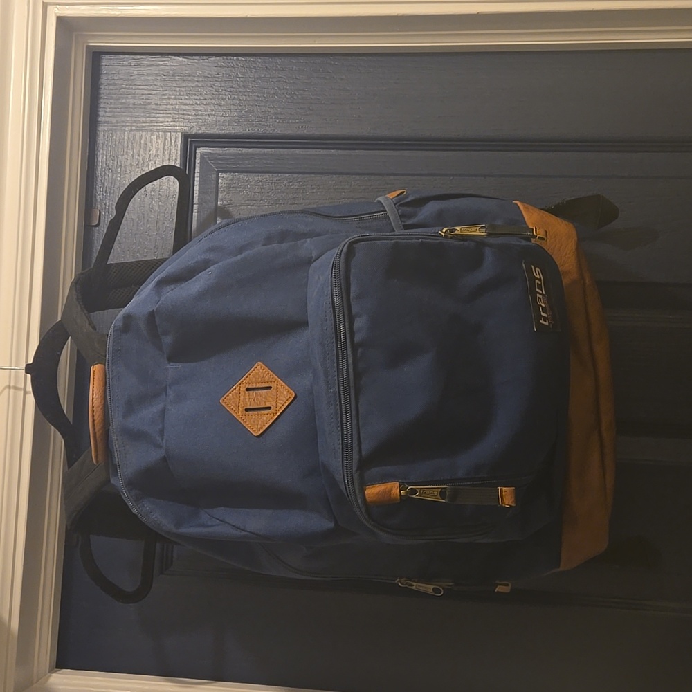 Trans by Jansport Navey blue with Faux Leather trim